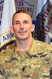 PEO Aviation welcomes LTC John Seitz as Product Manager for A2E2 (Aviation  Architecture and Environment Exploitation). Seitz assumed responsibilities  from Ray Scarborough, during an Assumption of Charter ceremony held