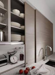 Image courtesy of elmwood fine custom cabinetry and innovative kitchen design. 15 Storage Ideas To Steal From High End Kitchen Systems Remodelista Sliding Cabinet Doors Best Kitchen Cabinets Kitchen Renovation