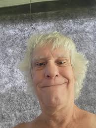 Larry Eisenhauer says hello to Tom Flores.