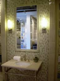 This diy mosaic craft can complement any interior décor, depending on the glass tiles used on the edges. Mirror Tile Wall Designs