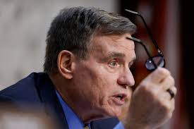 Who is Mark Warner's wife, Lisa Collis?