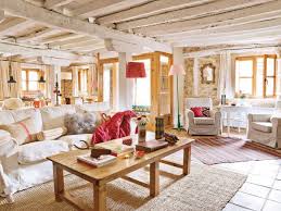 This rustic color palette mimics rocky terrain under a pale sky. Lovevly Rustic Cottage Interior Featuring A Surprising Color Palette