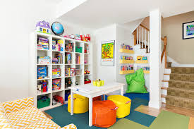 A colorful bright play sign is perfect for the corner of a room designated for coloring, pretending, and dressing up. White Blue And Yellow Playroom Colors Transitional Media Room