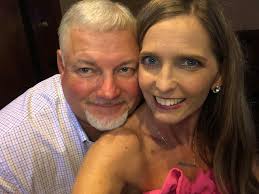 Watching friends play at the hockey game