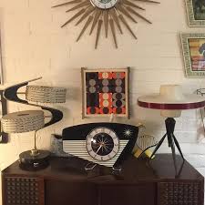 Midcentury modern sunburst wall clock. Starburst Clocks By Royale Home Facebook