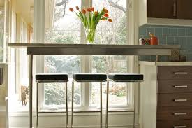 See the top 5 kitchen window treatments and start cooking up ideas. Great Solutions For Low Kitchen Windowsills