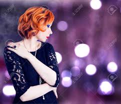Give texture to your asymmetric waves and get nice wispy points for a difference. Short Curly Red Hair Fashion Woman Portrait In Retro Style Stock Photo Picture And Royalty Free Image Image 25236370