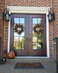She transformed a standard single front door design with sidelights into a breathtaking, custom wood double door. 5 Beautiful Front Entry Doors