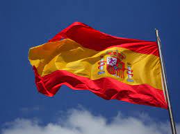 Belajar bahasa spanyol dengan video tutorial kami! Bendera Spanyol Di Kutub Foto Stok Gratis