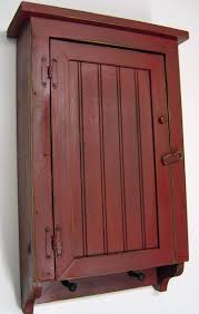 Amazon Com Cabinet Primitive Country Rustic Wood Beadboard Face With Pegs Barn Red Wall M Primitive Decorating Country Barn Red Kitchen Primitive Bathrooms