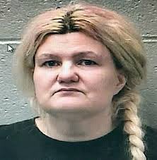 Wife, Stepson of KKK Leader in Missouri Charged With His Murder