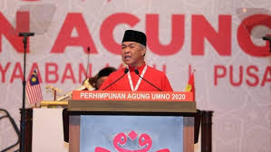 A poster of united malays national organisation president ahmad zahid hamidi: Commentary Umno Has Tumbled From Its Height Of Power Cna