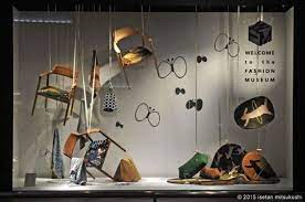 This Dispay Uses The Element Of Surprise To Catch The Eye Of People Passing By By Having The Items In U In 2021 Window Display Design Shop Window Design Window Display
