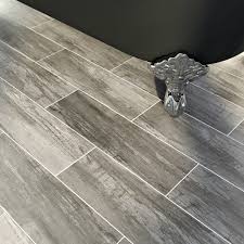 Shop our range of brick effect metro tiles for kitchen splashbacks & bathroom walls alike, inspired by the iconic london underground & nyc subway aesthetic. British Ceramic Tile Bark Charcoal Wood Effect Grey Matt Tile 148mm X 498mm Victoriaplum Com