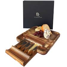 Acacia wood board is crafted with a beautiful, natural bark decor all around it. The Best Cheese Board July 2021