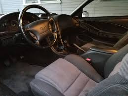 The car is finished in white over a tan cloth interior Sold 1995 Mustang Gt In Los Angeles Ca 2800 Stangnet