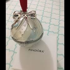 The ornament for this year is a white porcelain bell, hanging from the usual white ribbon. Pandora Holiday Beautiful Pandora Christmas Ornament Poshmark