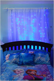 What A Simple But Brilliant Idea Blue Fairy Lights Behind Organza For That Perfect Disney Frozen Inspired Bedroom Frozen Room Frozen Bedroom Princess Bedrooms