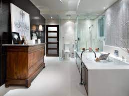 This bathroom design comprises neutral colors, grey and white, contrasted by dark violet and the silver accessories complement the final look, employed in the bathtub and sink. Our Favorite Designer Bathrooms Hgtv