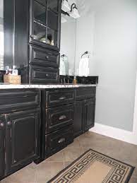 Distressing is a process used to give your kitchen furniture an aged look. Black Distressed Kitchen Cabinets Interior Design