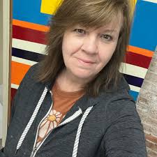 What can be added to oil paint to make it dry faster