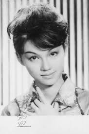 She's still beautiful even while frowning.