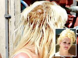 Long blonde hair in twisted style with low bun finish. Need A Brush Britney Spears Shows Off Head Full Of Ratty Bleached Blond Extensions And Bald Spot New York Daily News