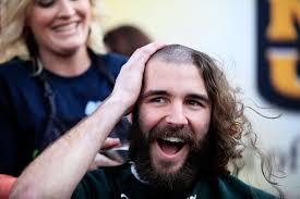 Columbia residents shave heads to aid fight against childhood cancer