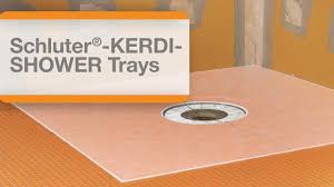 Sloped profiles transition tile to flooring/concrete. How To Install A Schluter Kerdi Shower Tray Protradecraft