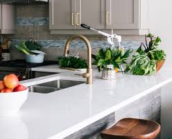 Gold kitchen faucets with pull down sprayer light up your life. Incorporating A Brushed Gold Faucet Into Your Kitchen