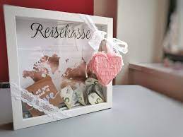 The envelope is elaborately decorated with gold and silver strings twisted and tied into a decorative knot. Excellent Pics Travel Fund As A Wedding Gift Ideas When Buying Specific Wedding Presents F Diy Wedding Gifts Wedding Gifts Wedding Presents For Newlyweds