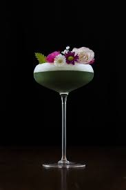 These edible flowers are eaten raw or cooked. The Art Of The Cocktail Garnish Cocktail Garnish Drink Garnishing Edible