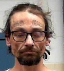 Man charged after woman robbed while she was walking in Clarksburg