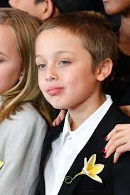 Knox Jolie-Pitt, 15, is the spitting image of his father Brad in unearthed  photos