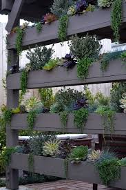 Maximize your space at home and try this creative vertical succulent! 20 Outdoor Vertical Garden Ideas Magzhouse