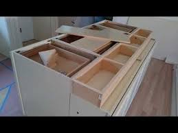 How Yo Build And Make A Double Sided Working Kitchen Island Using Base And Wall Cabinets Build Kitchen Island Diy Kitchen Island Kitchen Island Cabinets