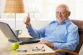 Portrait Of Happy Senior Man With Computer Stock Photo Download Image Now Istock