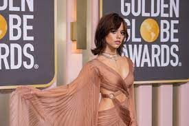 Jenna Ortega Draped Herself in Sheer Pleats and Cutouts at the 2023 Golden  Globes—See Pics | Glamour