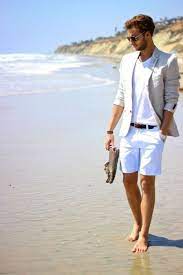 15 Men S Summer Outfits To Have Him Feeling And Looking Cool Society19 In 2021 Beach Wedding Men Summer Fashion Beach Mens Summer Fashion Beach