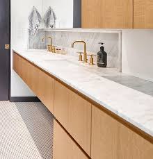 Whether you are looking for a completely white kitchen or white cabinets with contrasting countertops, there are many ideal combinations for your room. Contemporist Penny Tiles And Brass Fixtures Set The Scene For This Bathroom Design Contemporary Designers Furniture Da Vinci Lifestyle