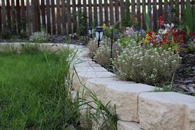 Concrete edges are probably the simplest to make. Apex Masonry How To Save Time With An Easy Mowing Strip