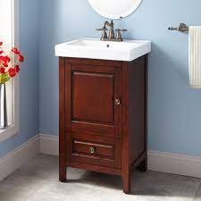 The ceramic surface accommodates the included rectangular sink in a crisp white finish. 20 Owens Vanity Walnut 20 Inch Bathroom Vanity Bathroom Vanity Small Bathroom Vanities