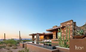 Maybe you would like to learn more about one of these? Contemporary Brown Exterior With Stacked Stone And Stucco Walls Luxe Interiors Design