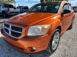 Image result for Sunburst Orange 2009 Caliber