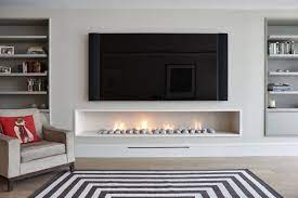 A gas fireplace is a simple advent that has been in use for quite a while now. Hole In The Wall Gas Fireplace Contemporary Modern Style Modern Fireplace Decor Contemporary Fireplace Home Fireplace
