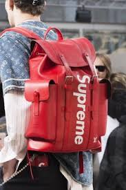 Black And Red Louis Vuitton Backpack See The Louis Vuitton X Supreme Accessories People Are Losing Their Minds Over Louis Vuitton Supreme Louis Vuitton Men Mens Fashion