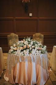 This Sweetheart Table Is Covered In Lush Flowers Gold Sequins And Sweetheart Table Wedding Sweetheart Table Flower Arrangements Wedding Table Decorations Diy