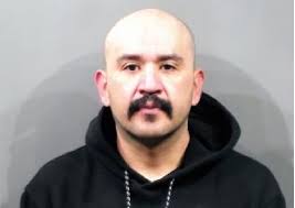 Police arrest 2 after Kansas motel parking lot gun fight