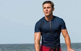 Zac efron gets in dwayne johnson's face while filming a new scene for baywatch on saturday (march 5) in miami, fla. Zac Efron Reveals How He Got Jacked For Baywatch Scenes Zac Efron Zac Efron Baywatch Baywatch