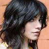 A girl with delicate features can afford a mess of artistic strands. 1